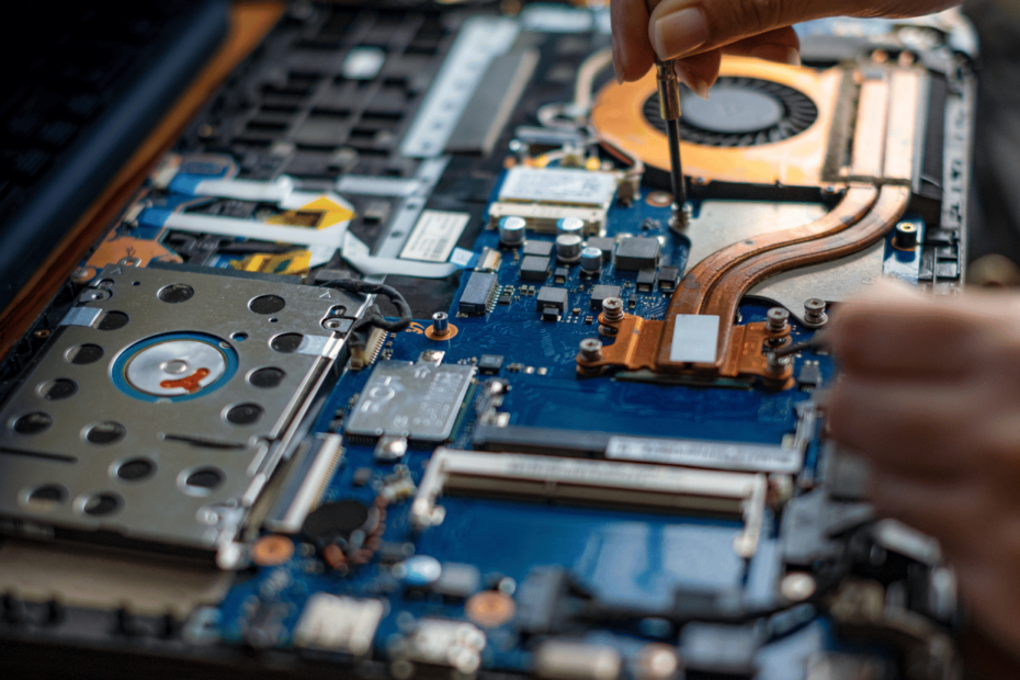 Image of Technician Repairing a MacBook at FixMyMac Bukit Jalil - Macbook Repair in Malaysia