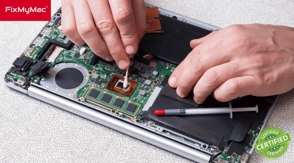 Technician repairing Macbook at FixMyMac - Macbook Repair Specialist in Malaysia